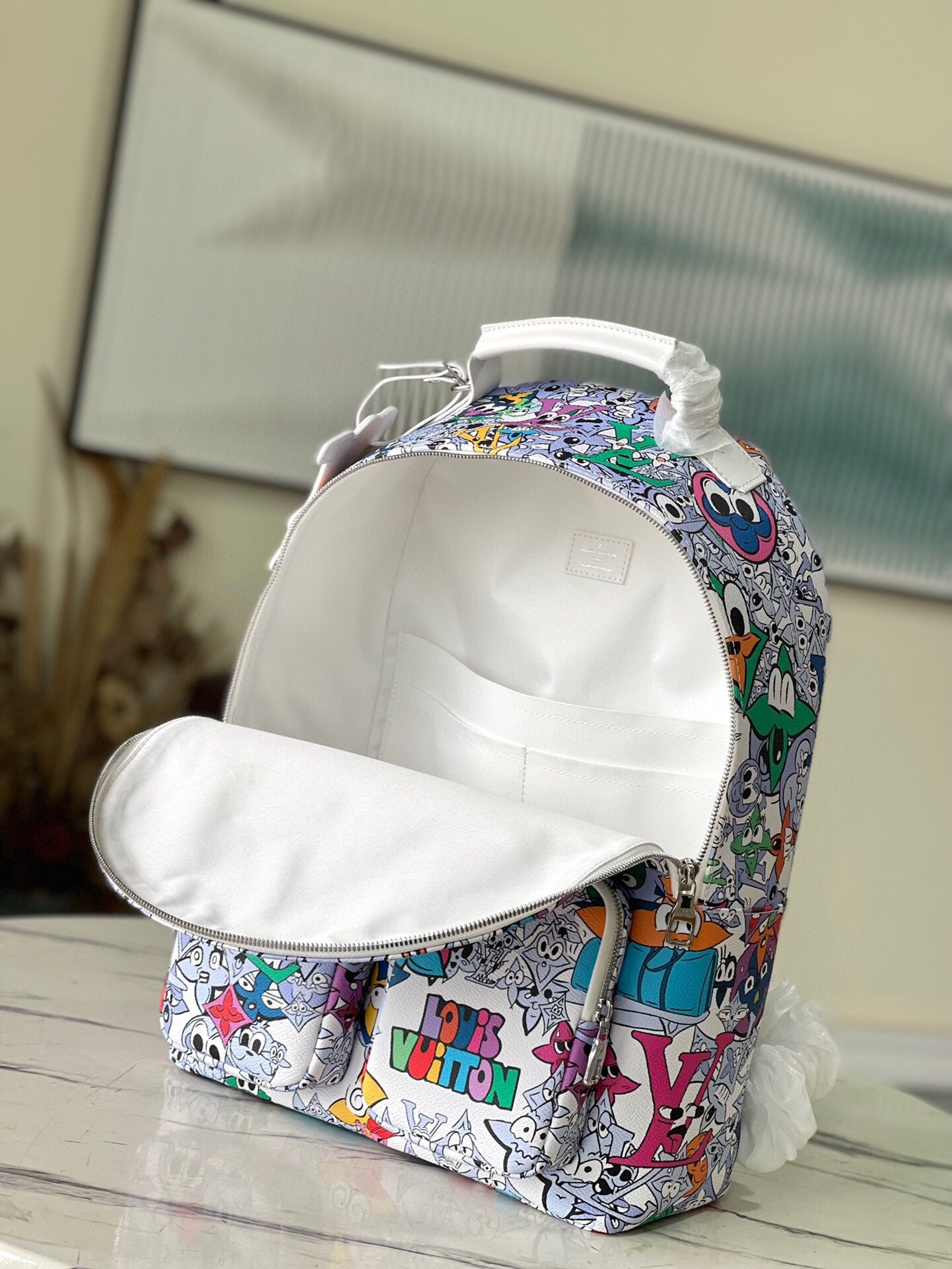 Coated Canvas Multipocket LV bagpack
